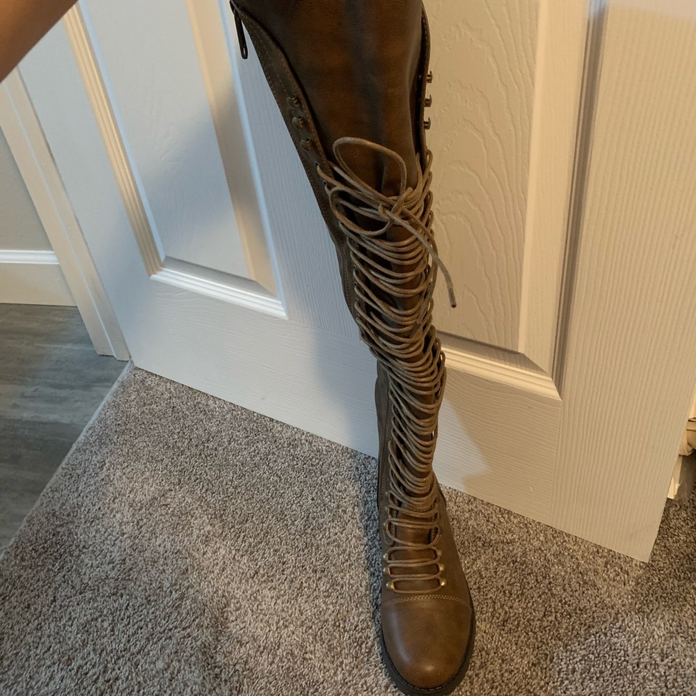 Tall dark brown boots